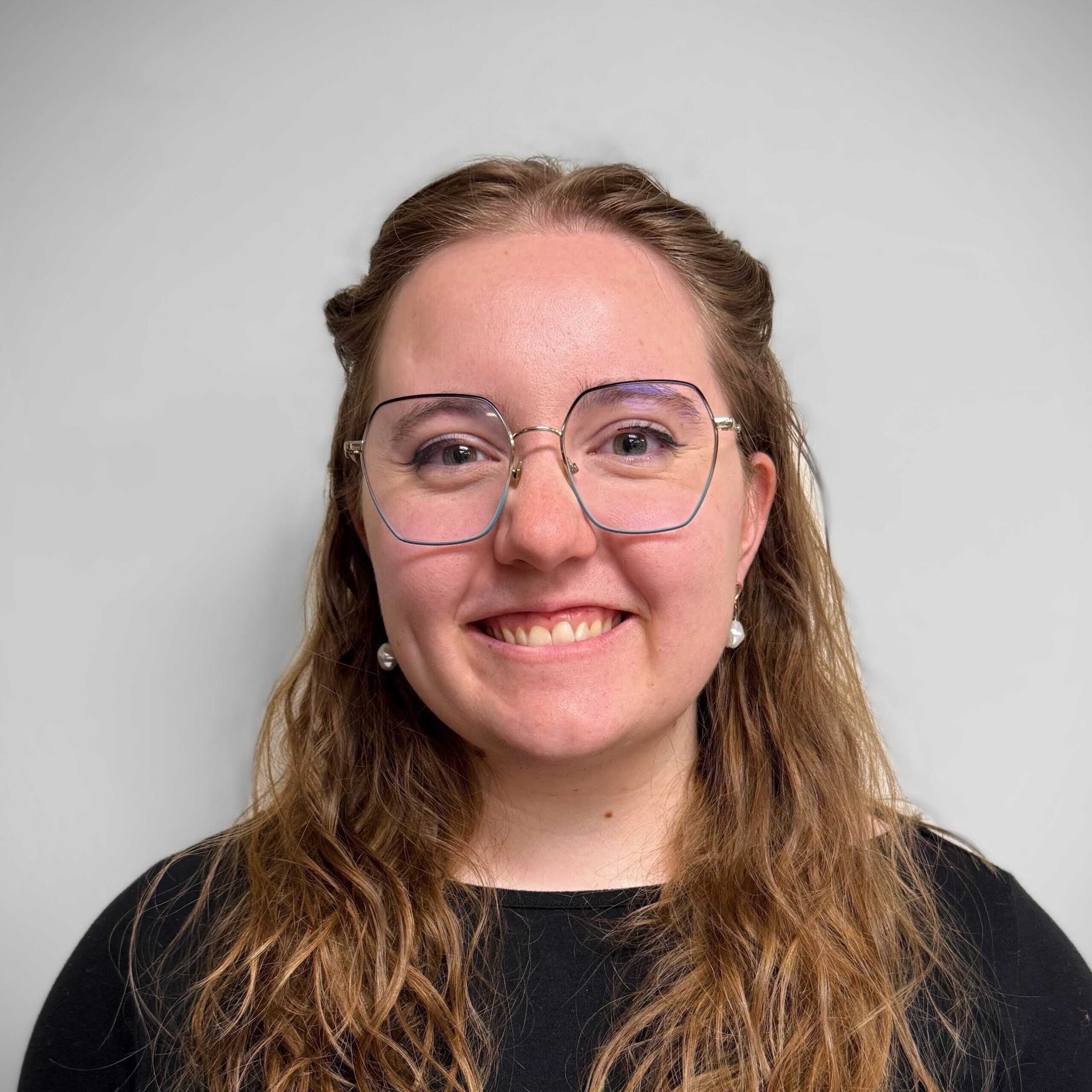 The image displays a sepia-toned "Coming Soon" sign with an ornate black frame, creating a vintage promotional or placeholder effect.