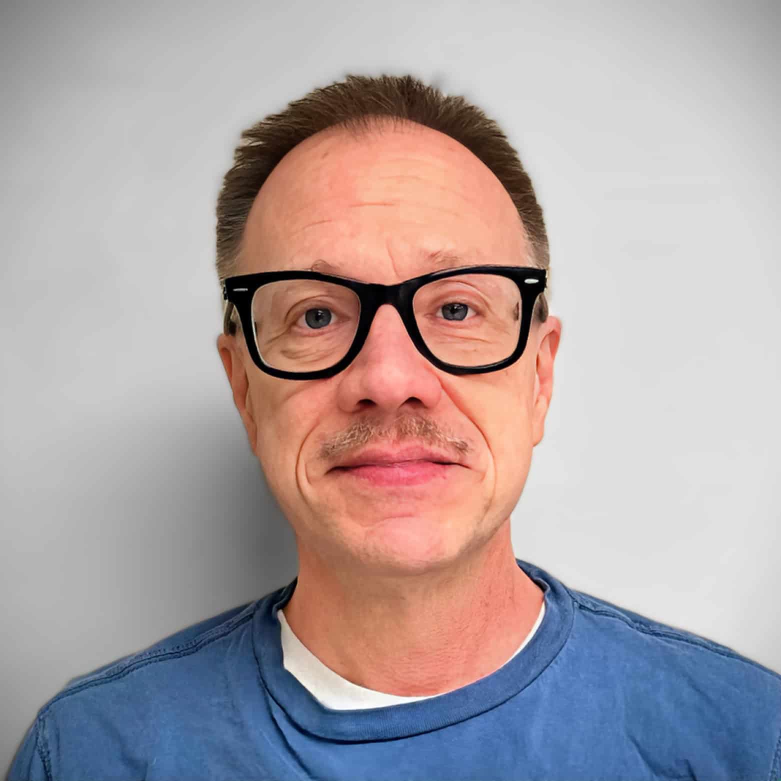 The image displays a sepia-toned "Coming Soon" sign with an ornate black frame, creating a vintage promotional or placeholder effect.