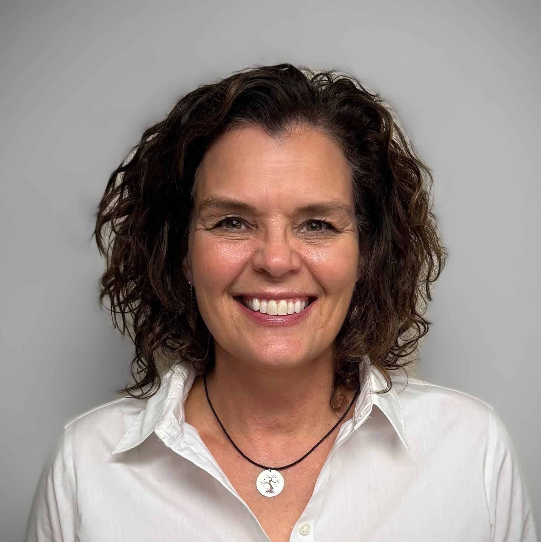 The image displays a sepia-toned "Coming Soon" sign with an ornate black frame, creating a vintage promotional or placeholder effect.