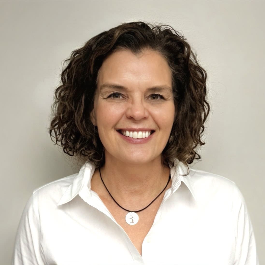 The image displays a sepia-toned "Coming Soon" sign with an ornate black frame, creating a vintage promotional or placeholder effect.